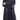 Close-up of transparent white buttons and cuffs on black silk abaya
